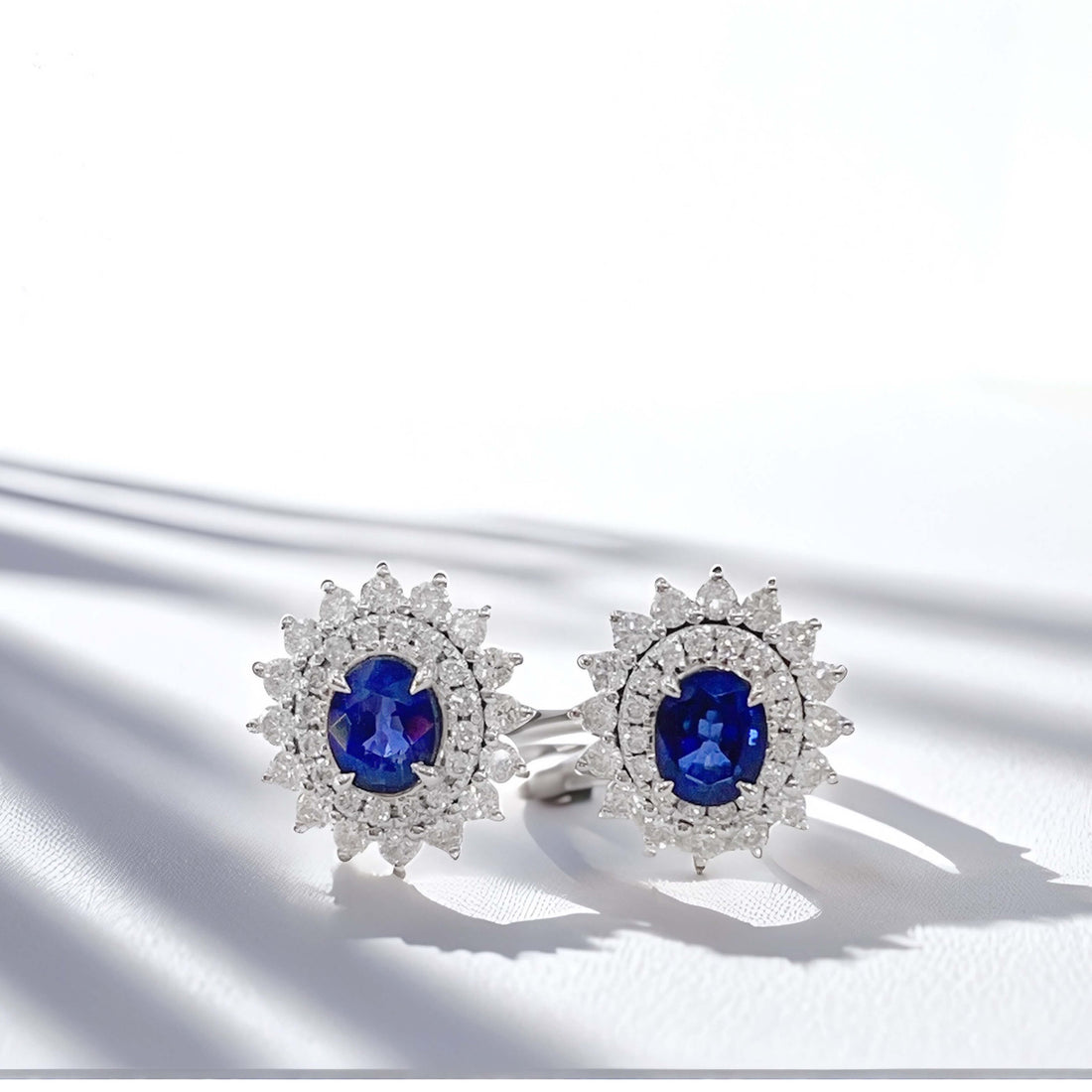 Halo setting oval cut lab grown sapphire earrings stud