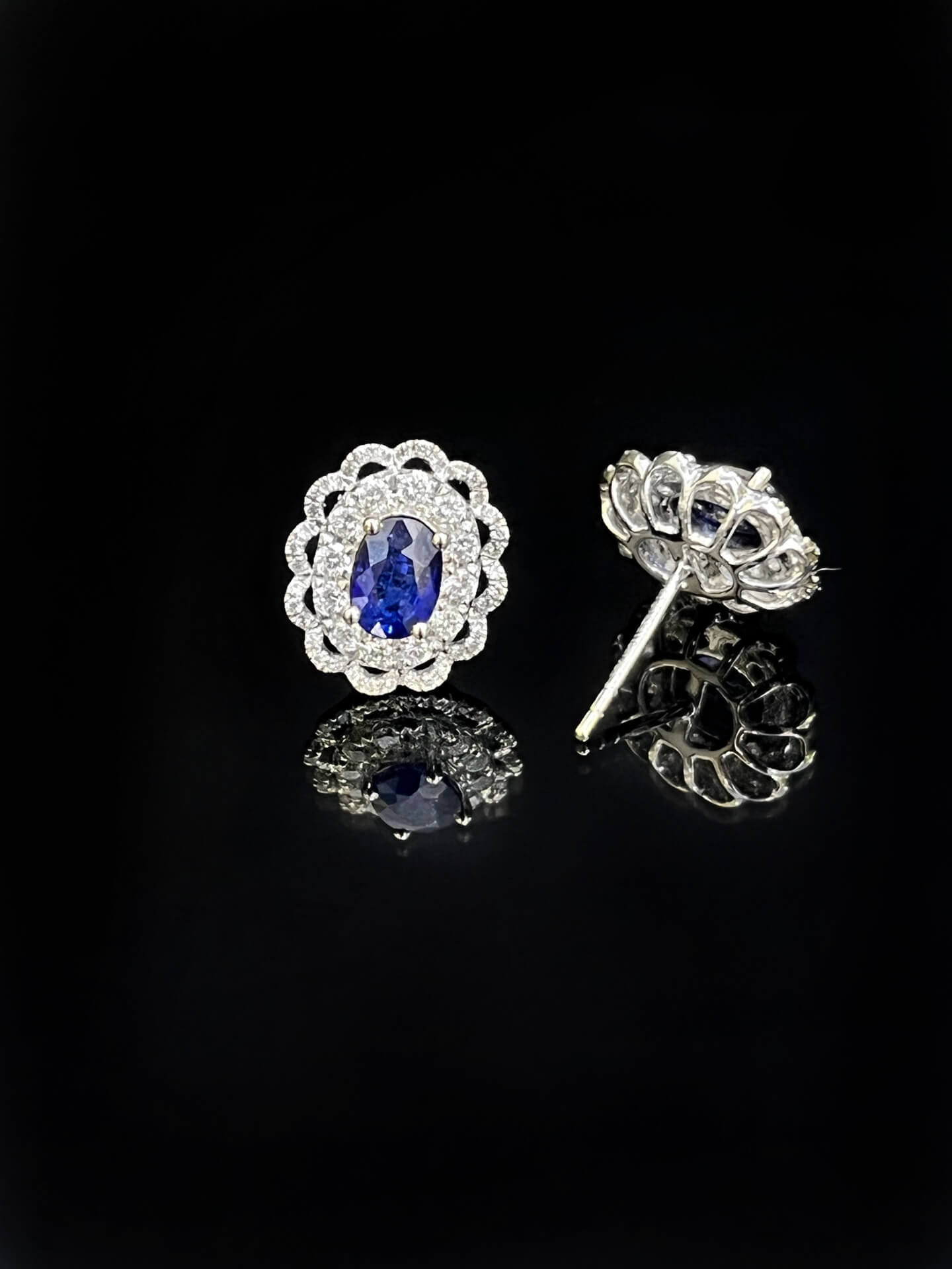 Halo setting oval cut lab grown sapphire earrings stud