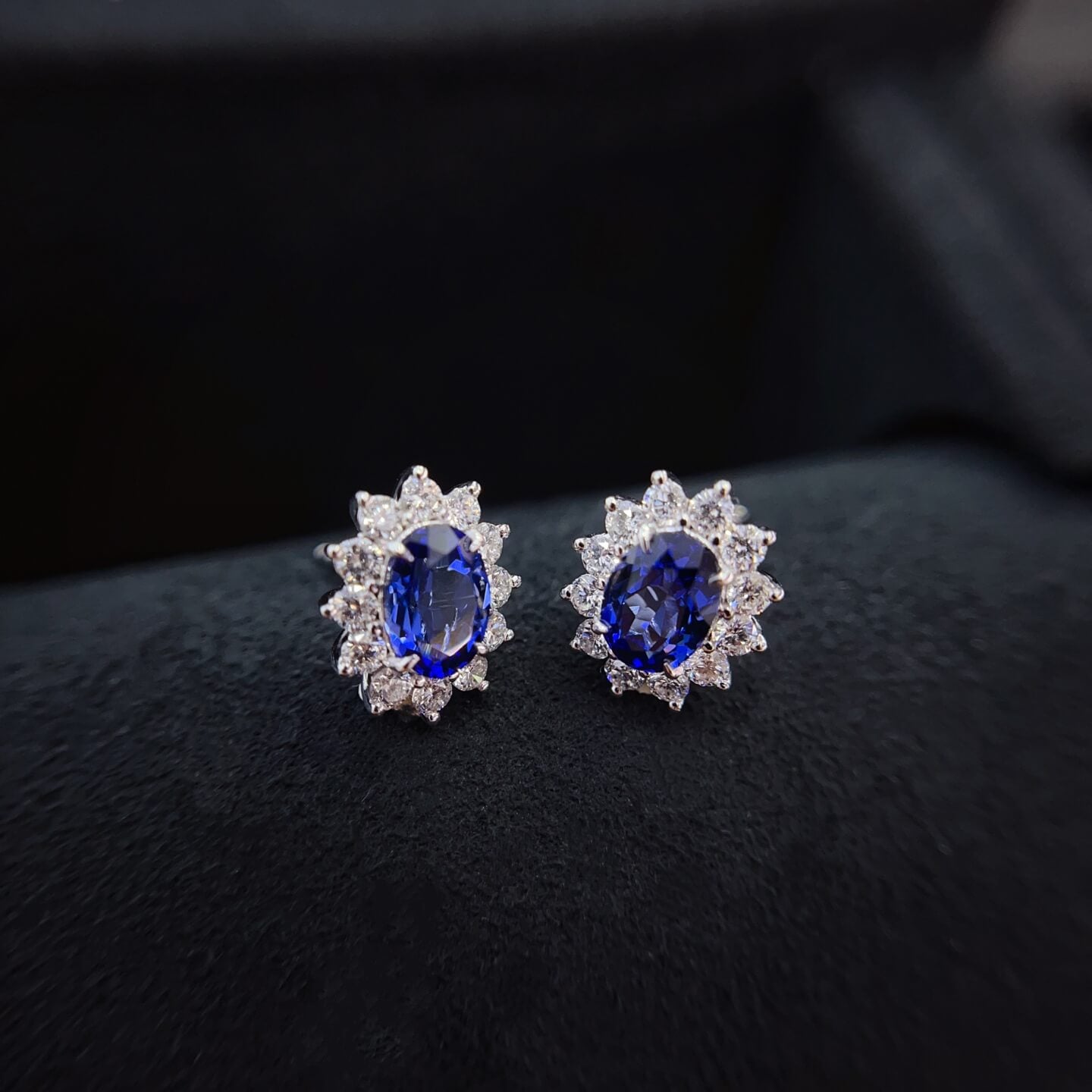 Halo setting oval cut lab grown sapphire earrings stud