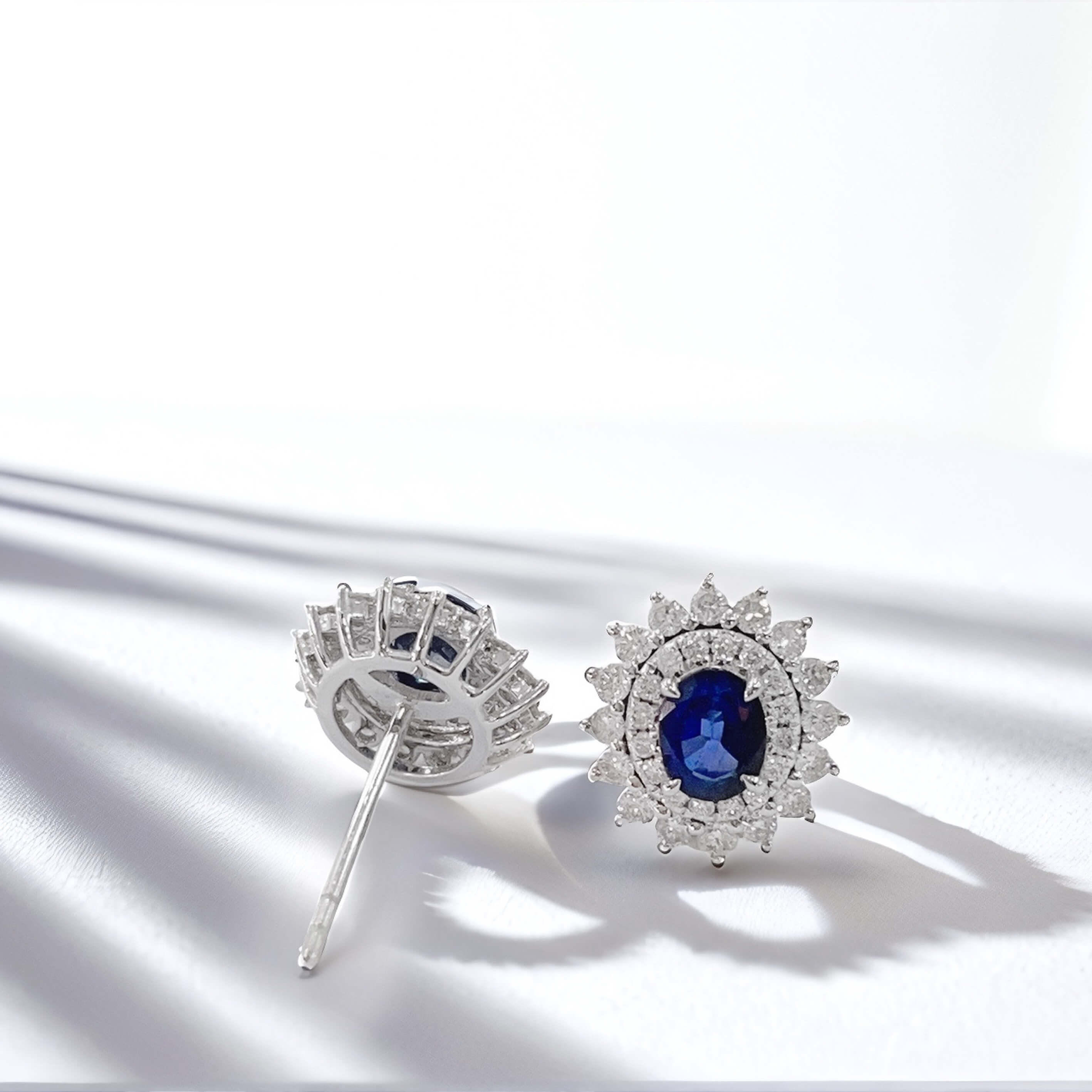 Halo setting oval cut lab grown sapphire earrings stud