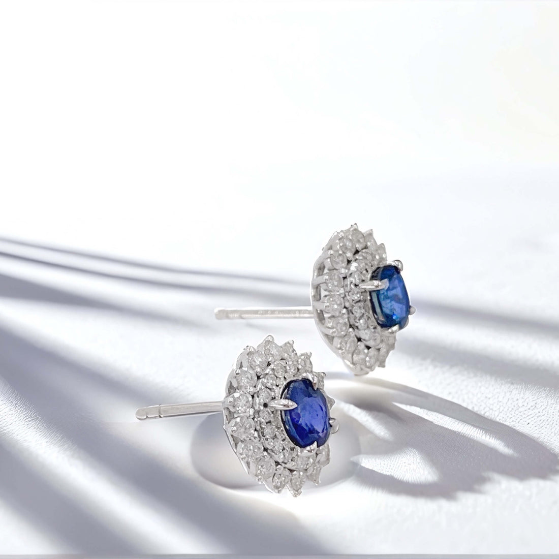 Halo setting oval cut lab grown sapphire earrings stud