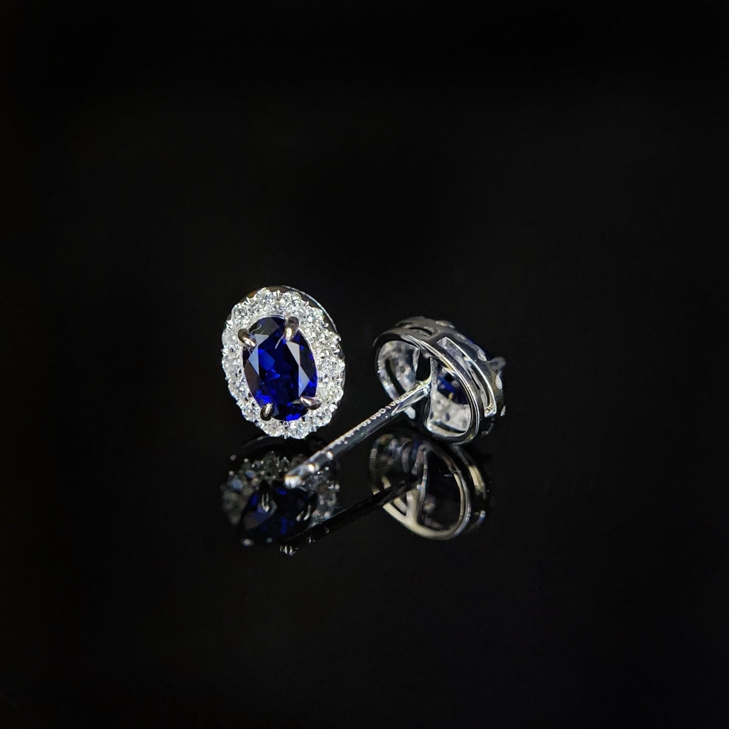 Halo setting oval cut lab grown sapphire earrings stud