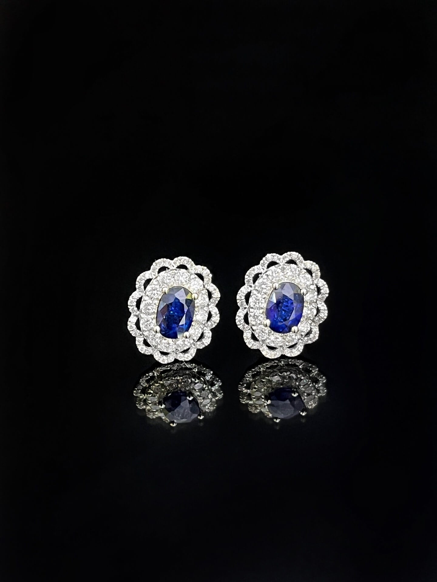 Halo setting oval cut lab grown sapphire earrings stud