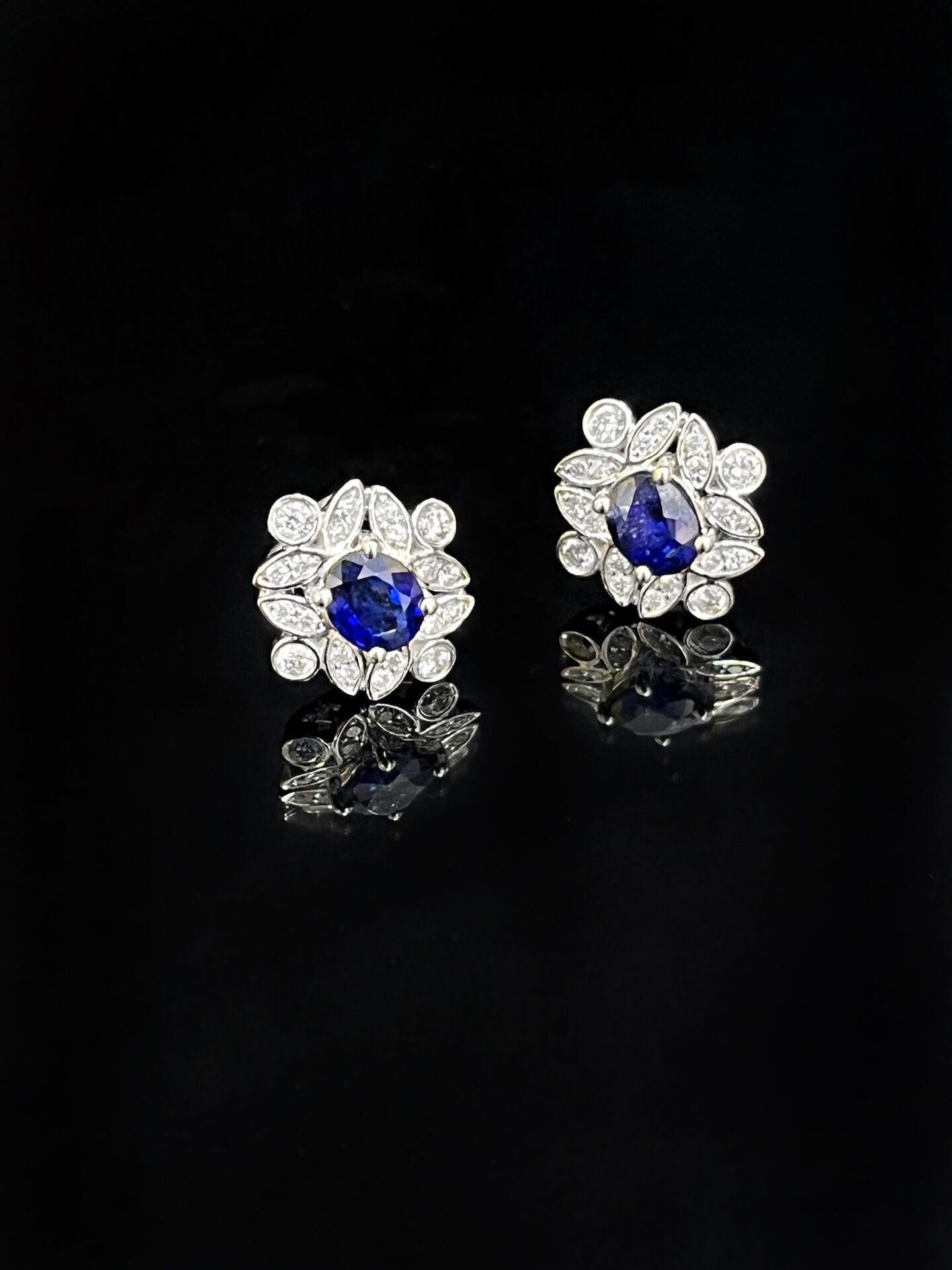 Halo setting oval cut lab grown sapphire earrings stud