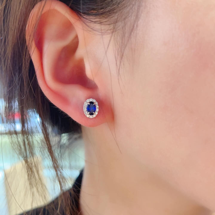 Halo setting oval cut lab grown sapphire earrings stud
