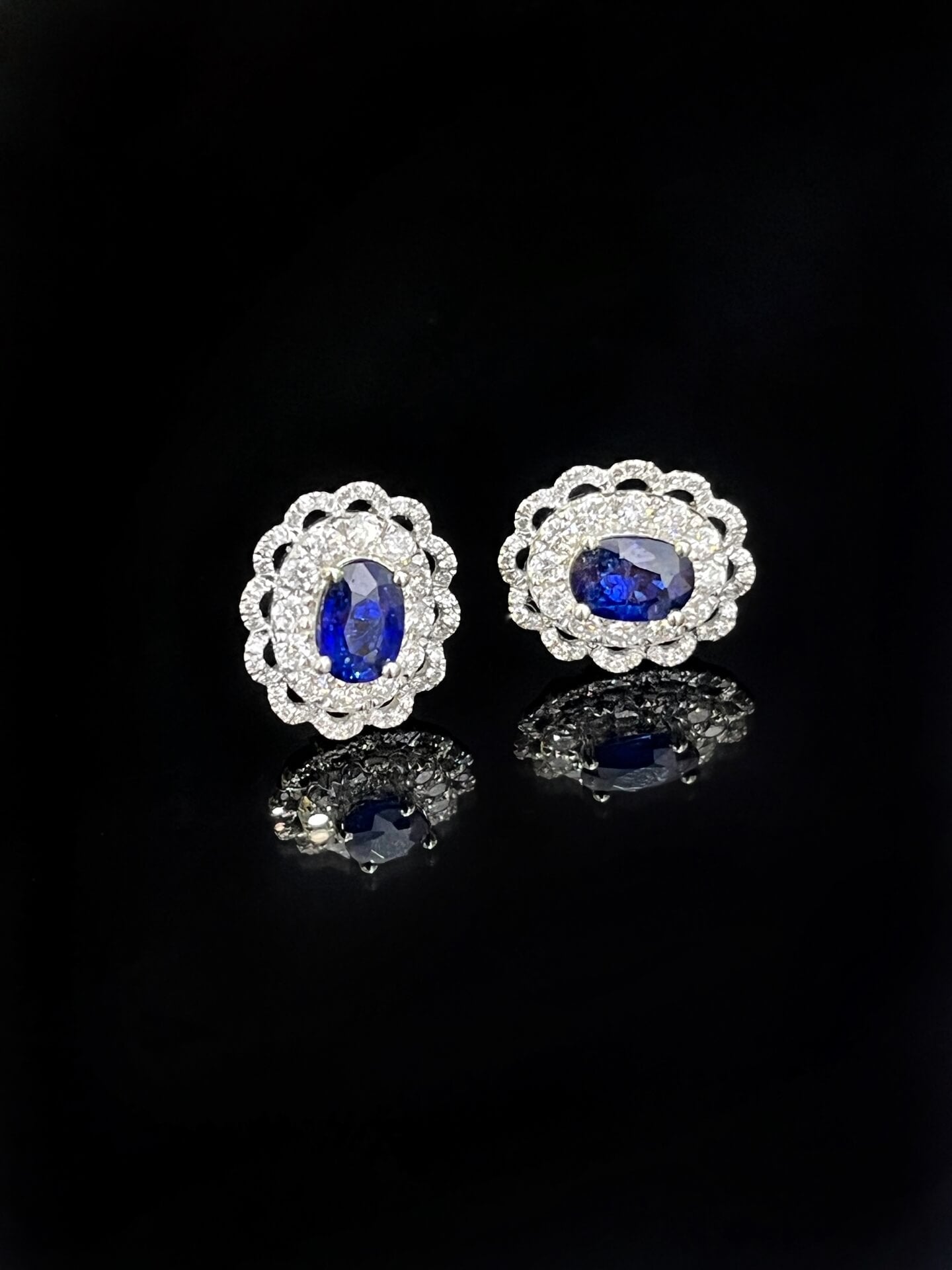 Halo setting oval cut lab grown sapphire earrings stud
