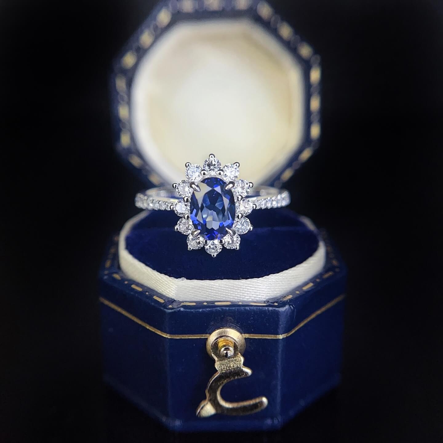 Halo setting oval cut  lab grown sapphire engagement ring