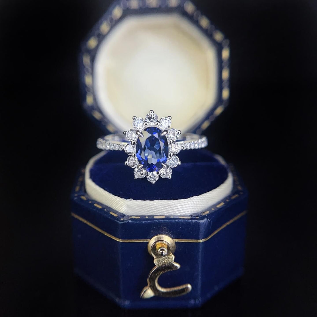 Halo setting oval cut  lab grown sapphire engagement ring