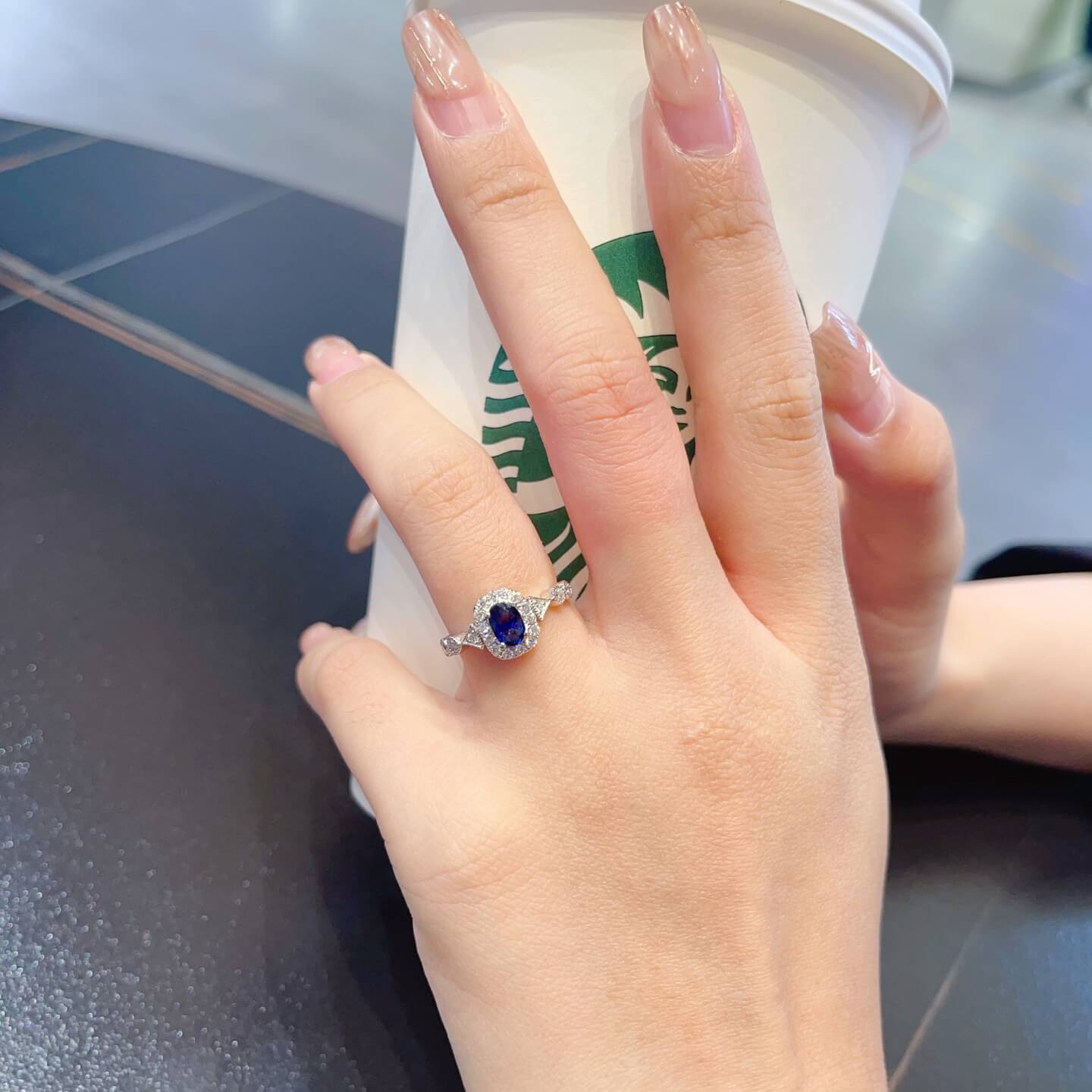 Halo setting oval cut  lab grown sapphire engagement ring