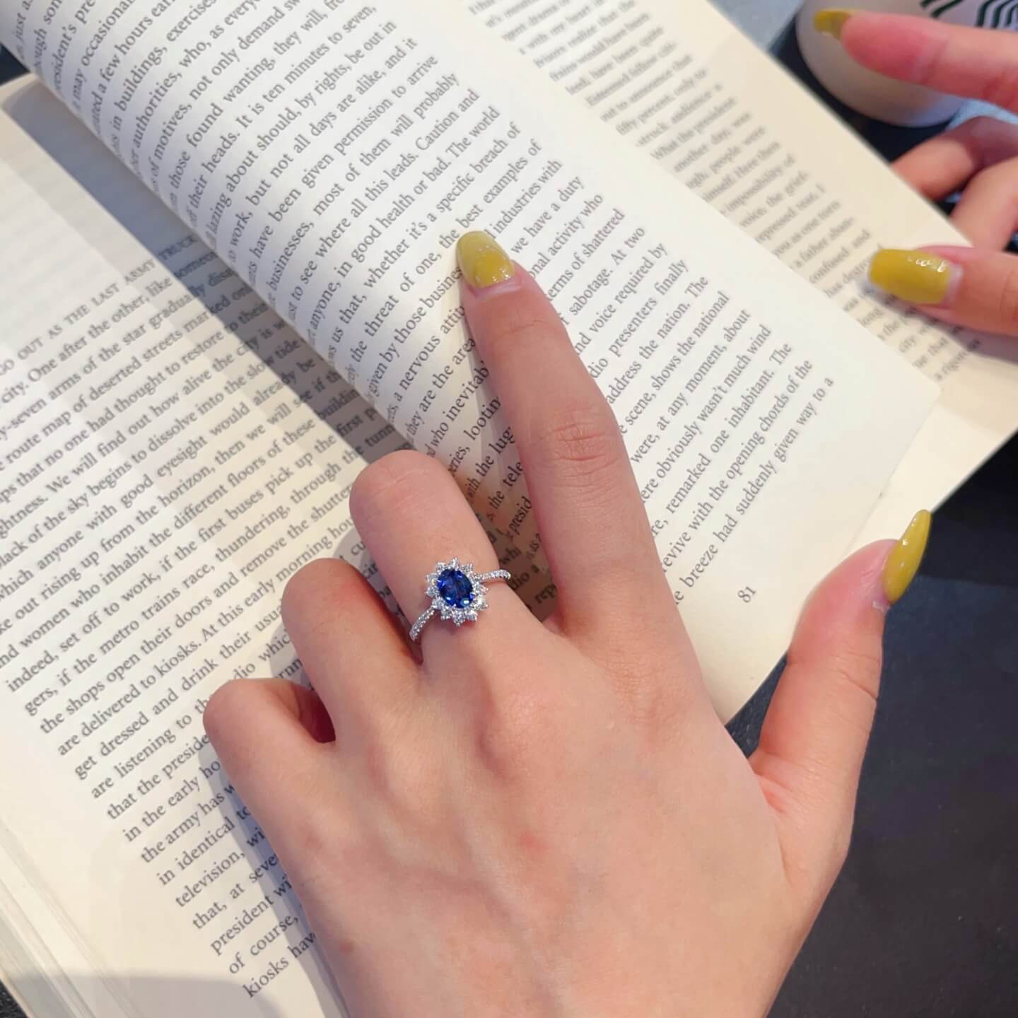 Halo setting oval cut  lab grown sapphire engagement ring