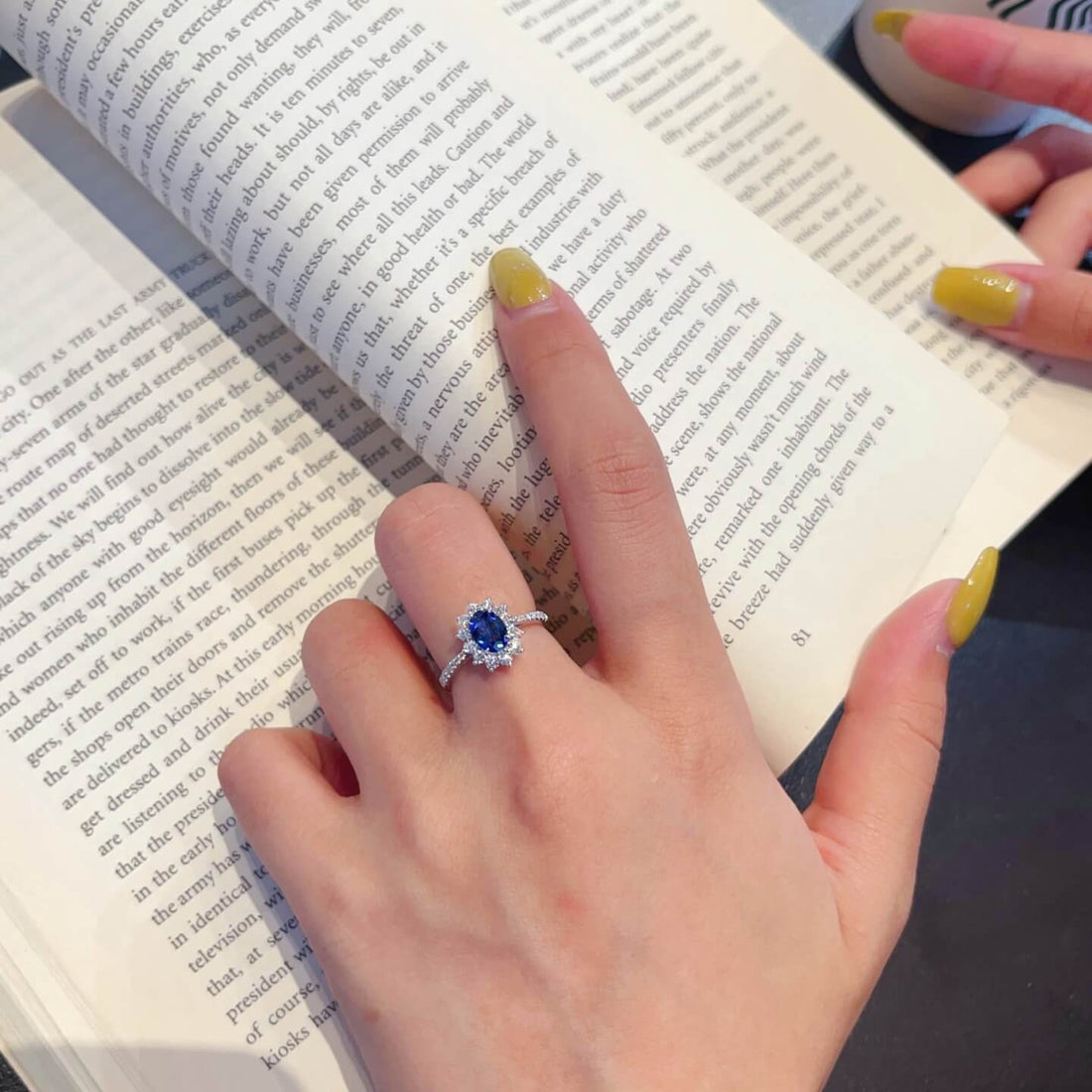 Halo setting oval cut  lab grown sapphire engagement ring