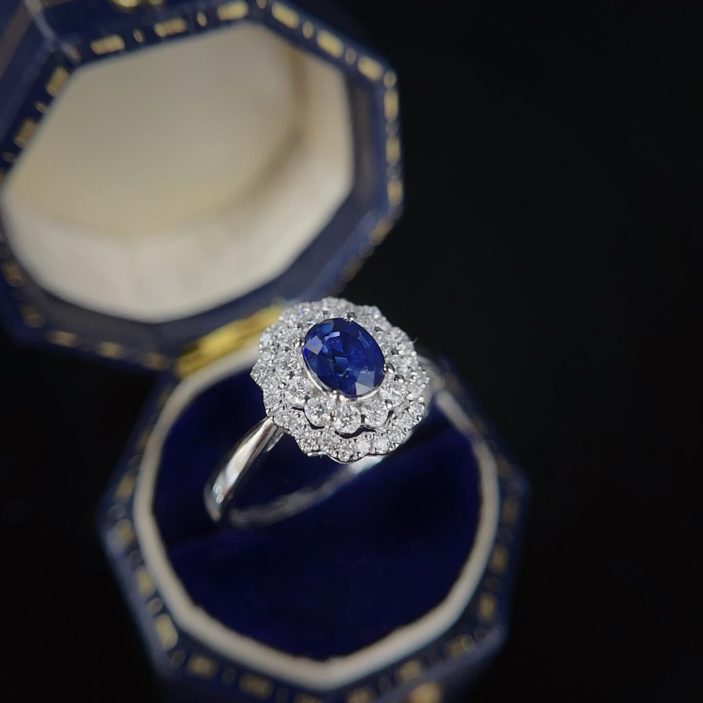 Halo setting oval cut  lab grown sapphire engagement ring