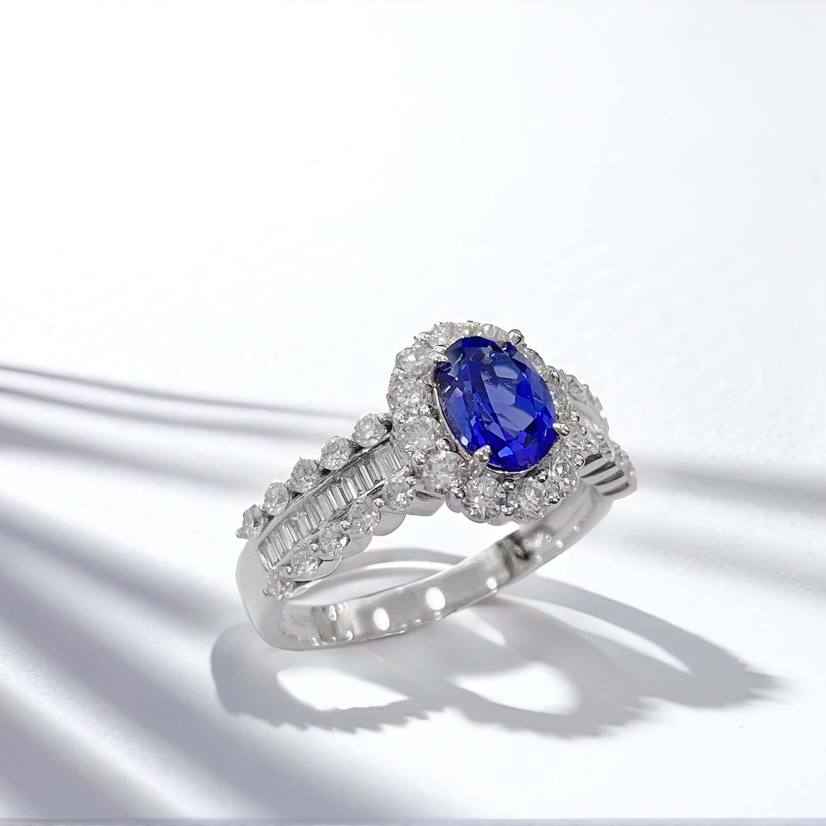 Halo setting oval cut  lab grown sapphire engagement ring