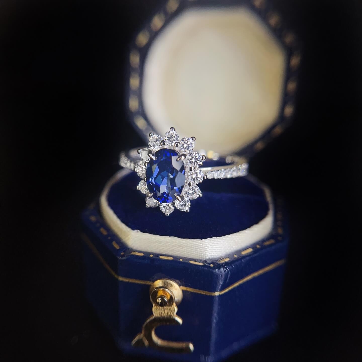 Halo setting oval cut  lab grown sapphire engagement ring