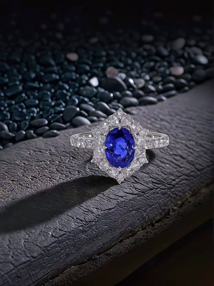 Halo setting oval cut  lab grown sapphire engagement ring