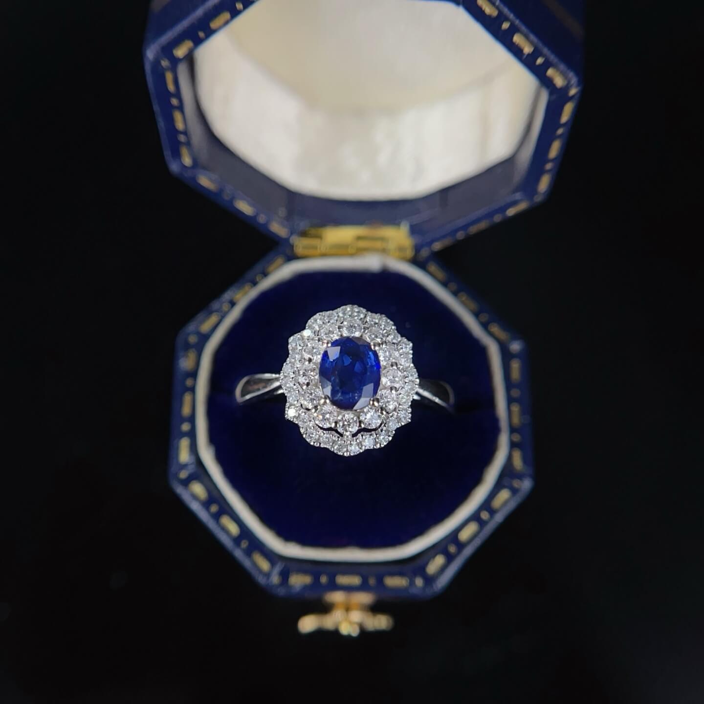 Halo setting oval cut  lab grown sapphire engagement ring