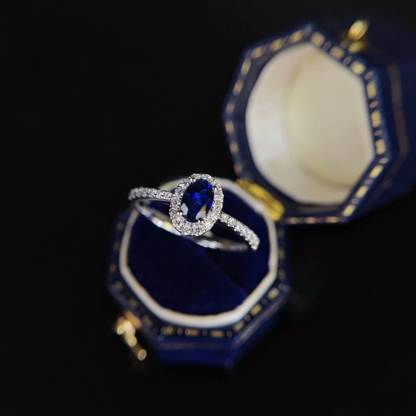 Halo setting oval cut  lab grown sapphire engagement ring