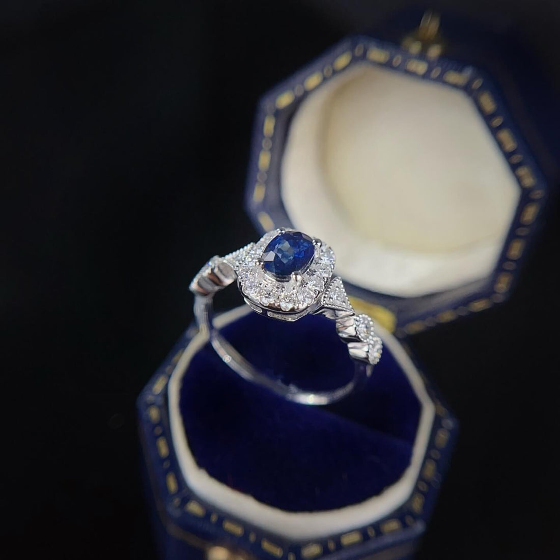 Halo setting oval cut  lab grown sapphire engagement ring