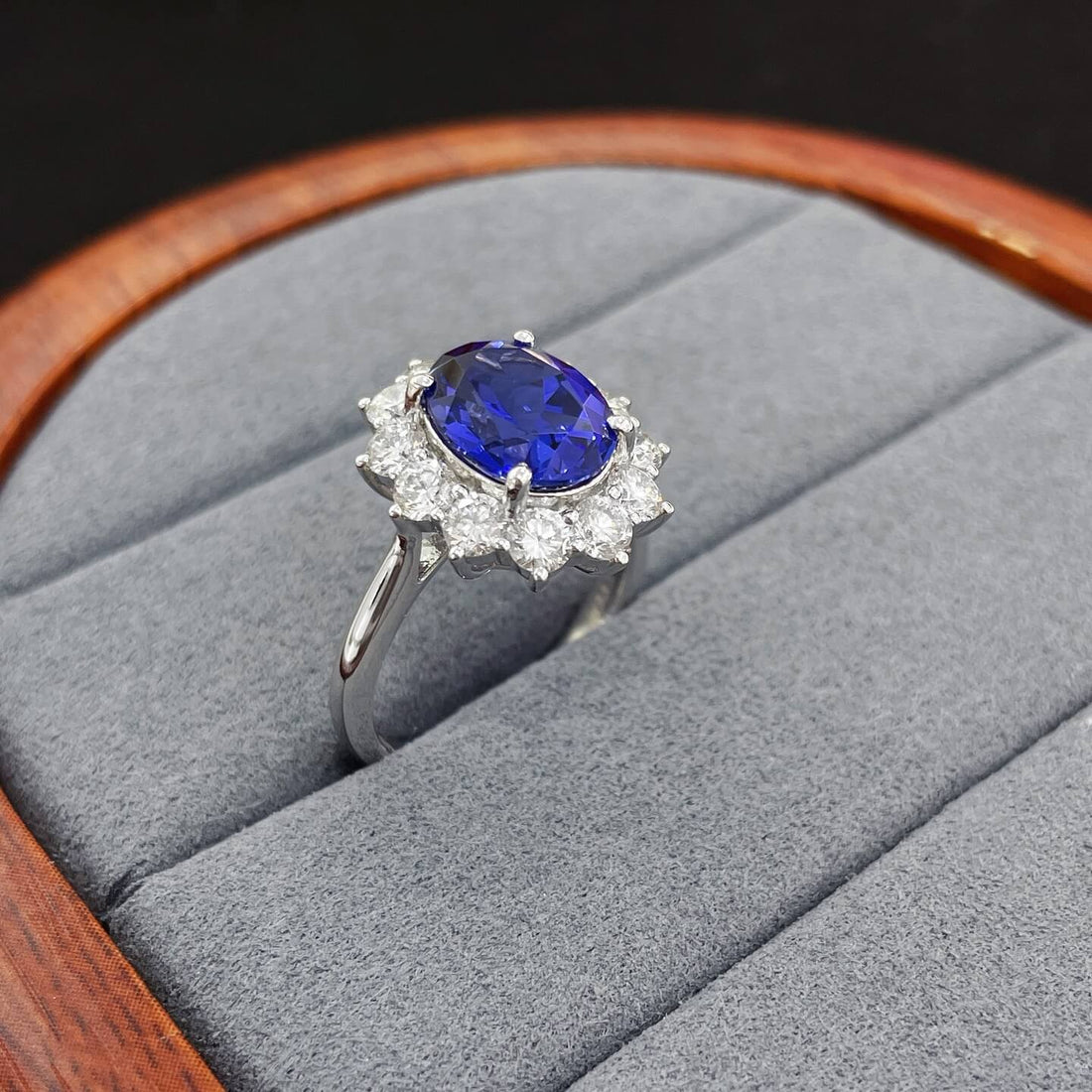 Halo setting oval cut  lab grown sapphire engagement ring