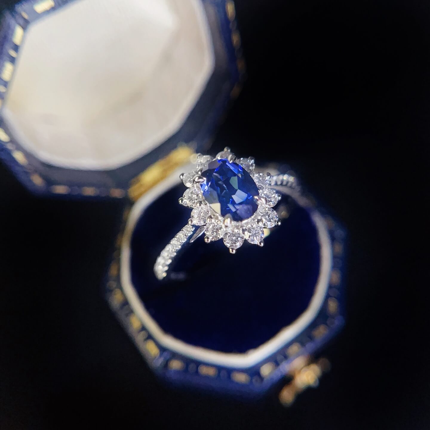 Halo setting oval cut  lab grown sapphire engagement ring