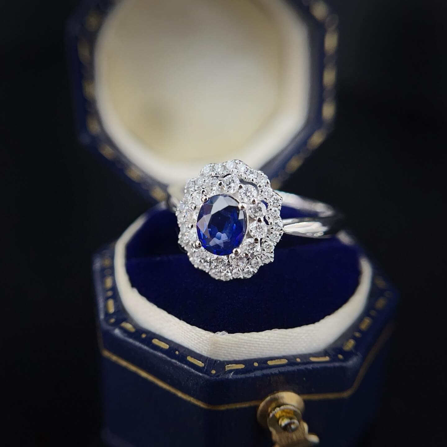 Halo setting oval cut  lab grown sapphire engagement ring