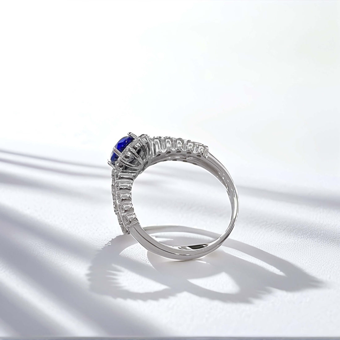 Halo setting oval cut  lab grown sapphire engagement ring