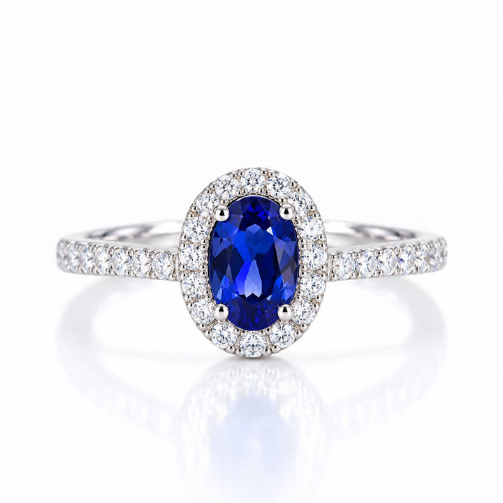 Halo setting oval cut  lab grown sapphire engagement ring