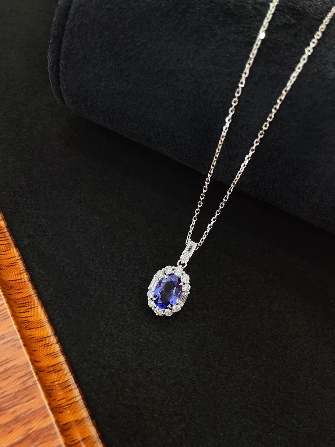 Halo setting oval cut lab grown sapphire pendant necklace