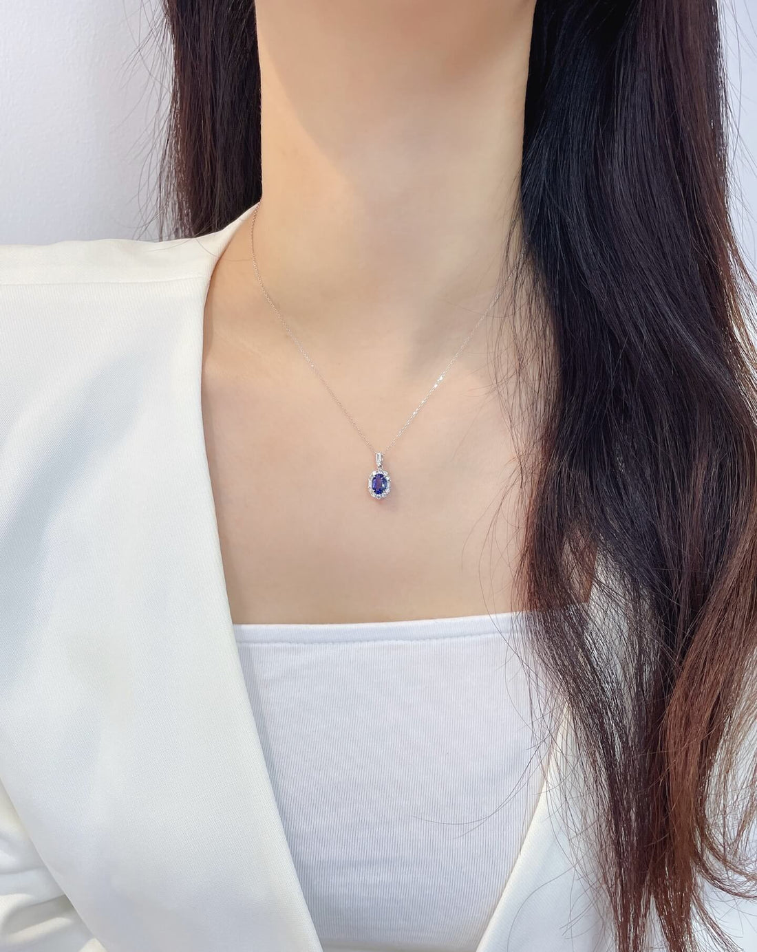 Halo setting oval cut lab grown sapphire pendant necklace