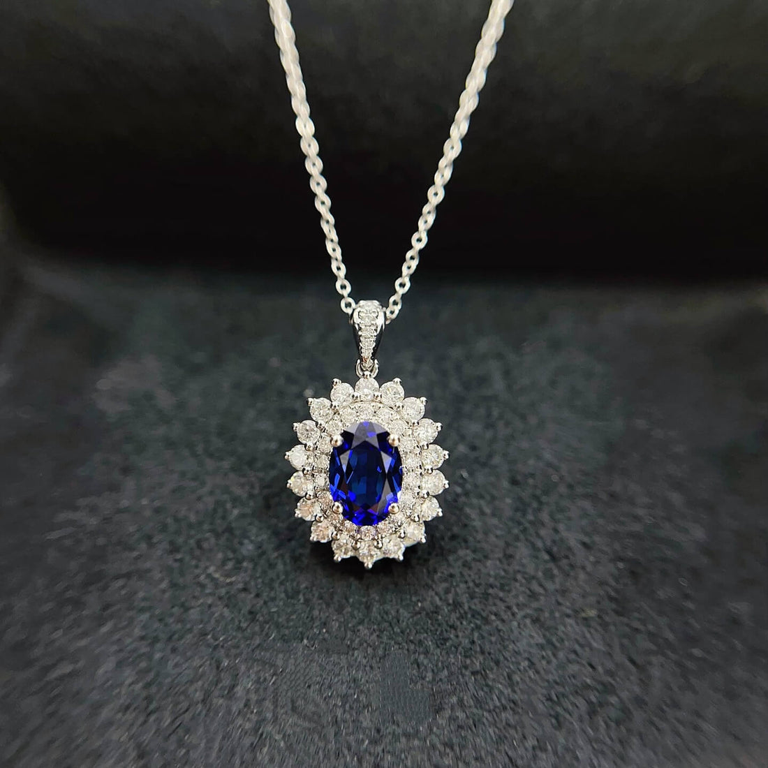 Halo setting oval cut lab grown sapphire pendant necklace