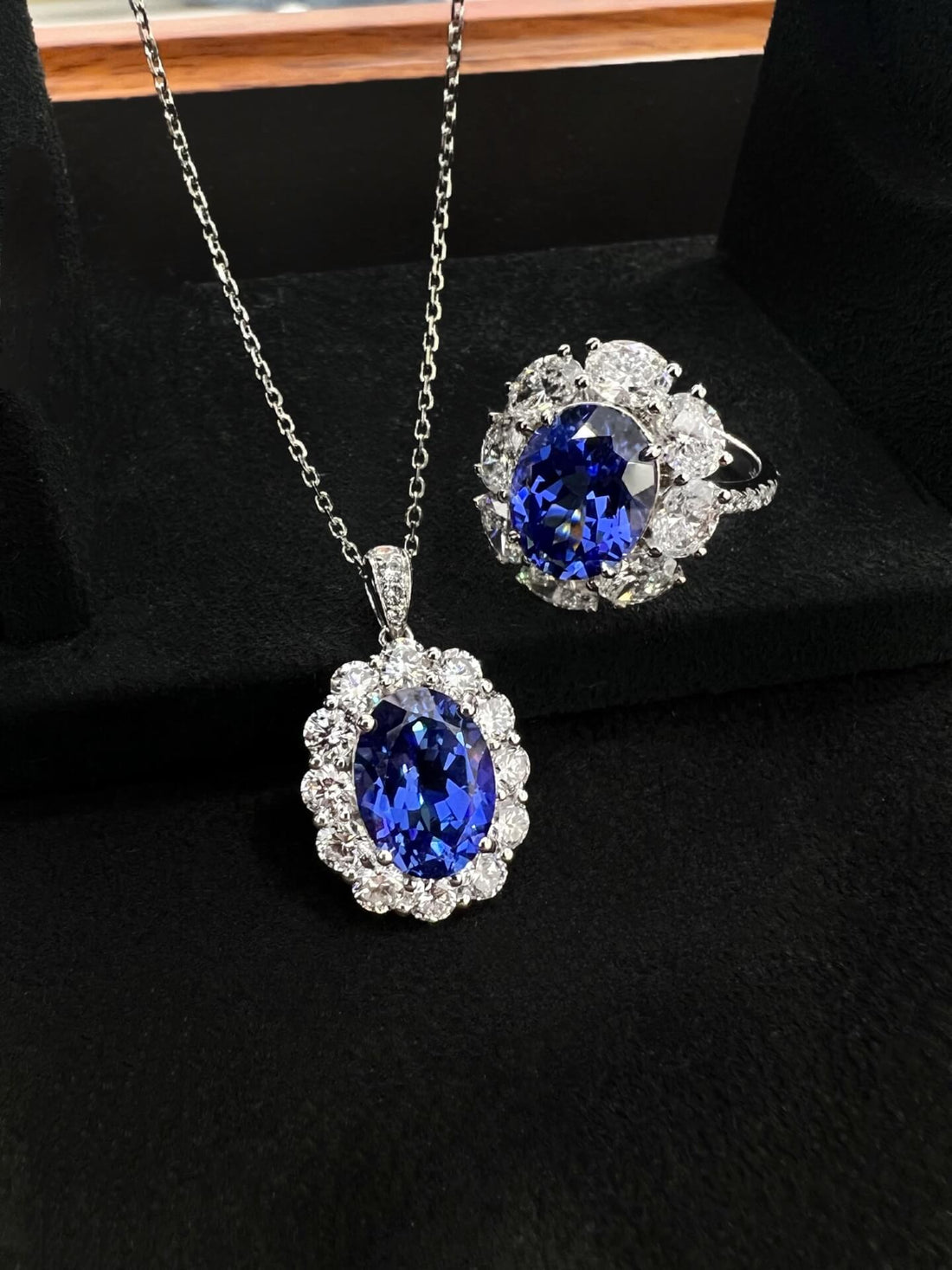 Halo setting oval cut lab grown sapphire pendant necklace