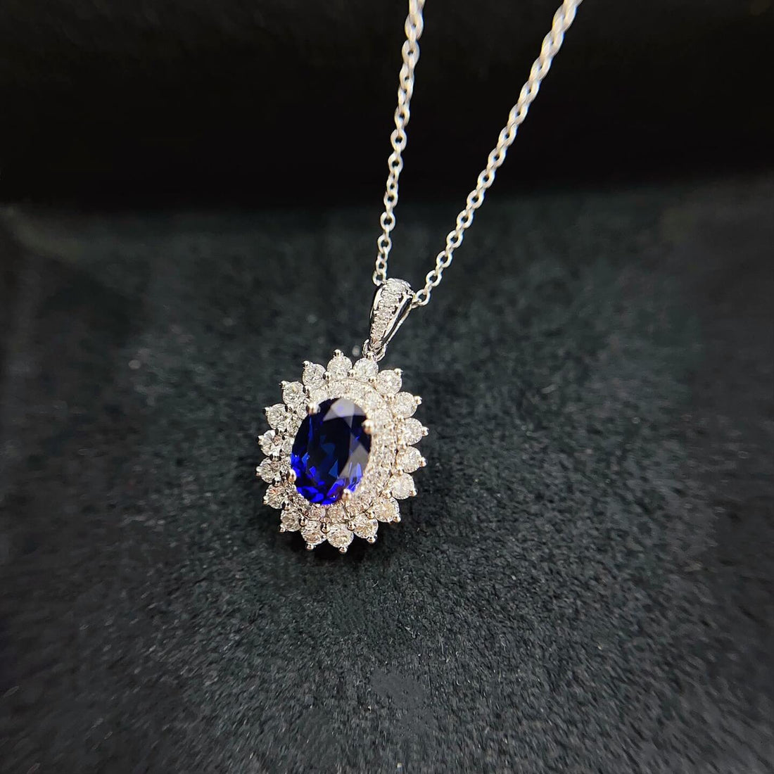 Halo setting oval cut lab grown sapphire pendant necklace