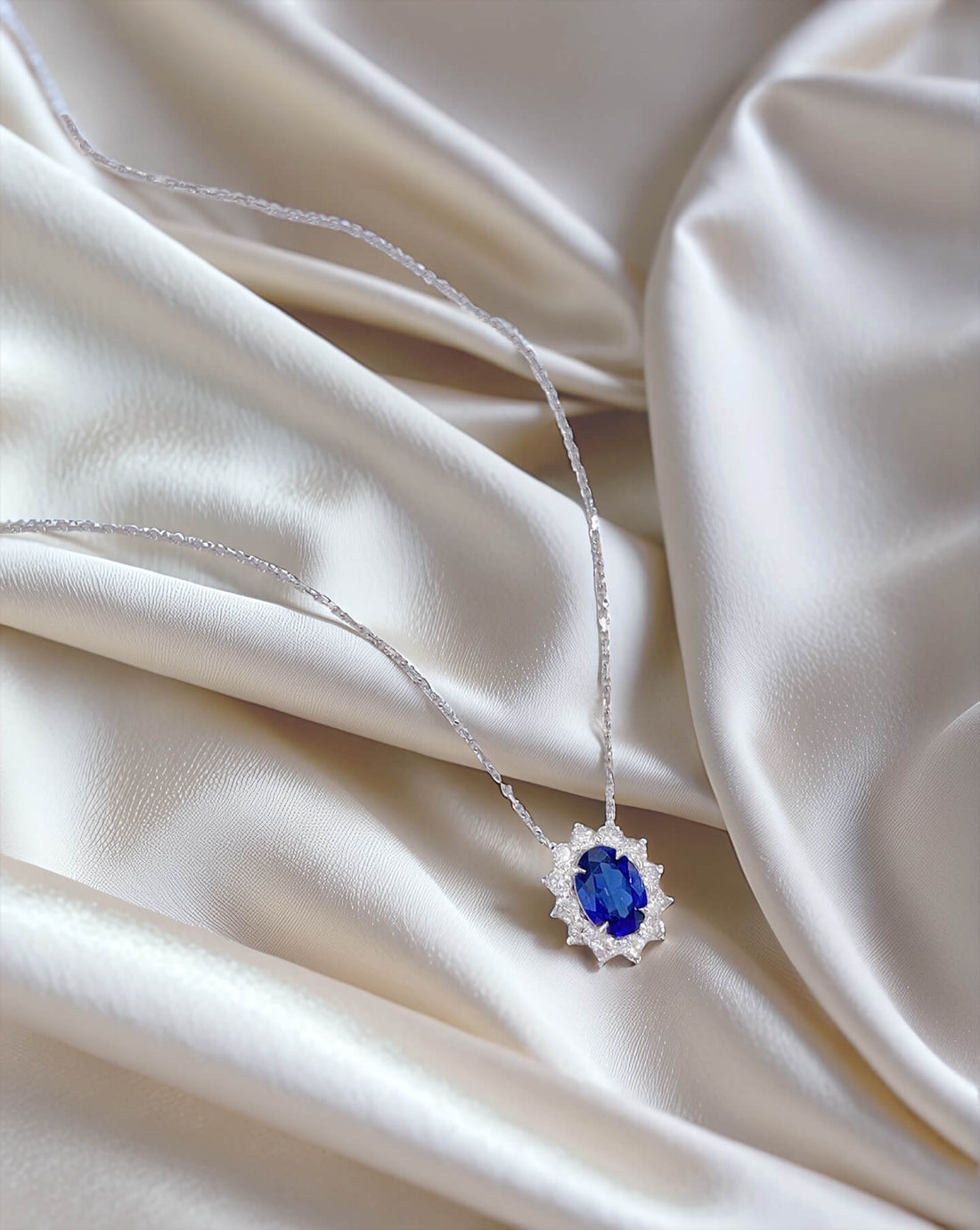 Halo setting oval cut lab grown sapphire pendant necklace