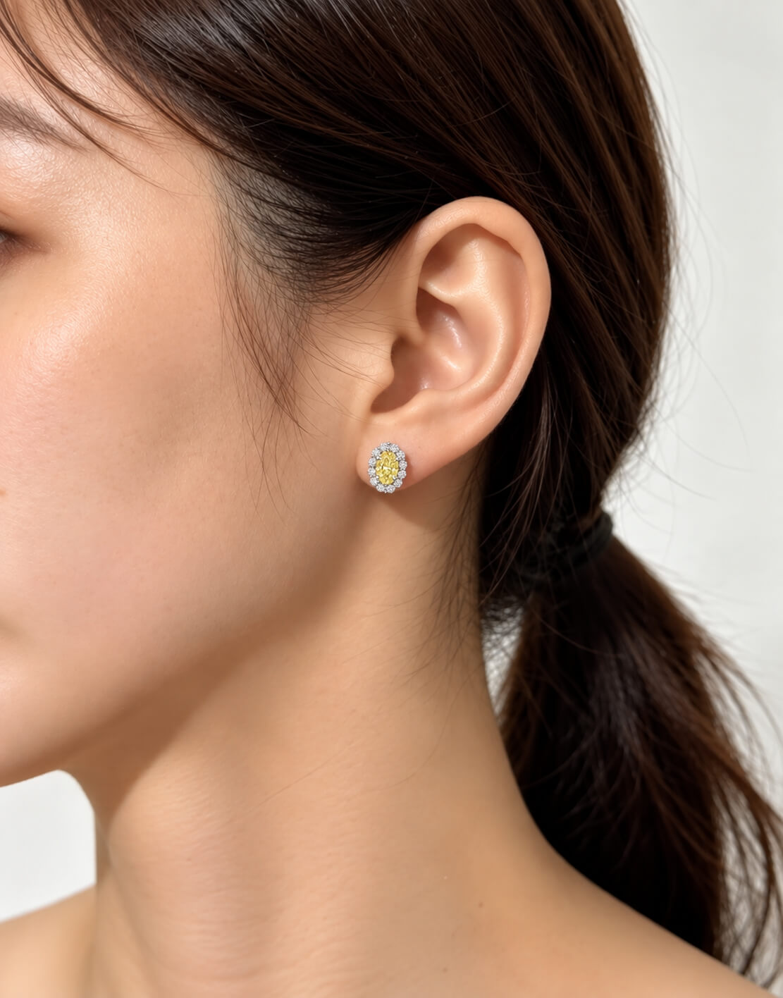 Halo setting oval cut lab grown yellow diamond earrings stud