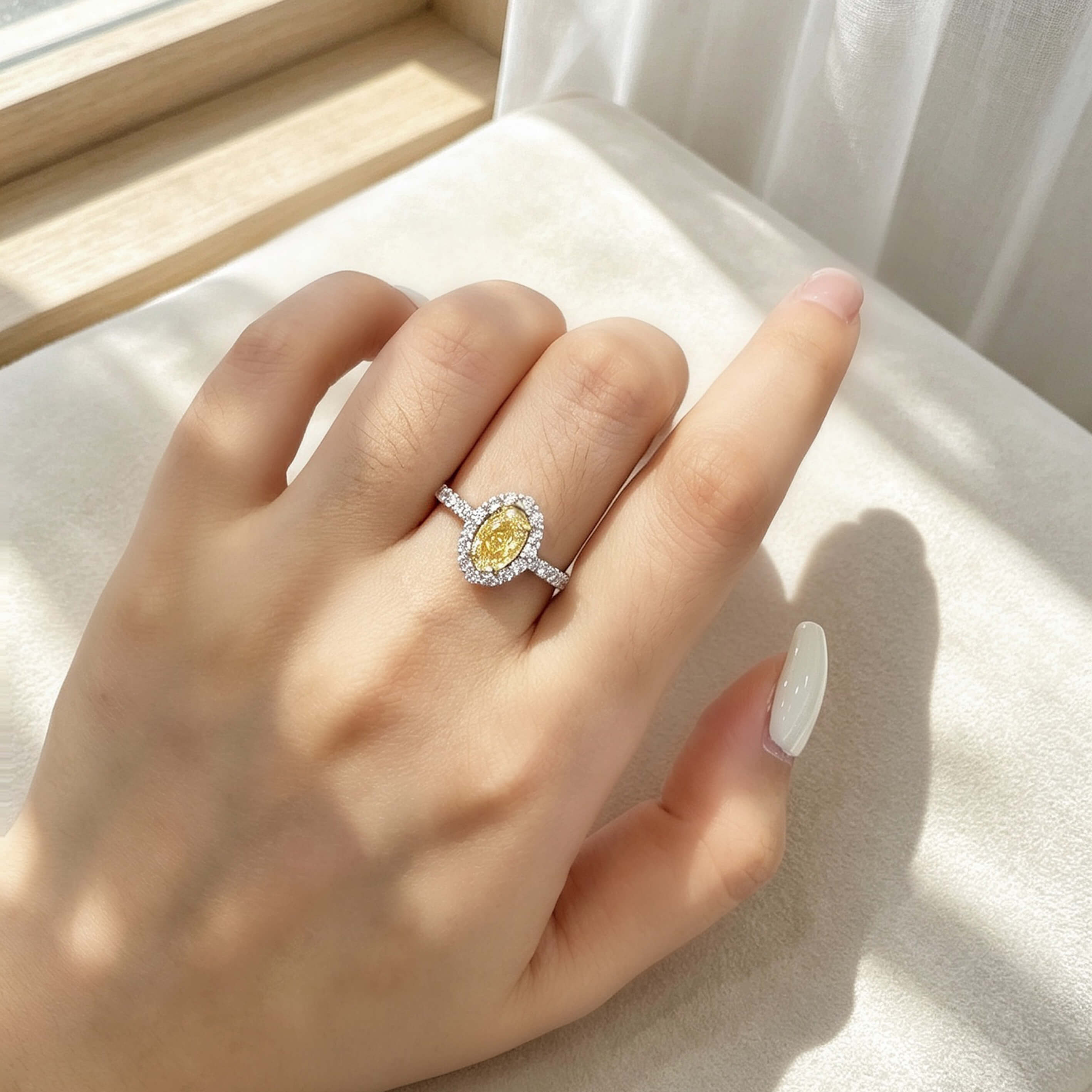 Halo setting oval cut lab grown yellow diamond engagement ring