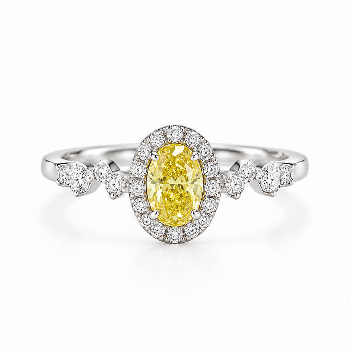 Halo setting oval cut lab grown yellow diamond engagement ring