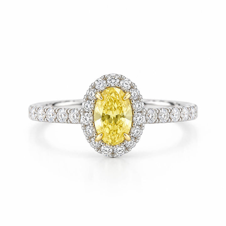 Halo setting oval cut lab grown yellow diamond engagement ring