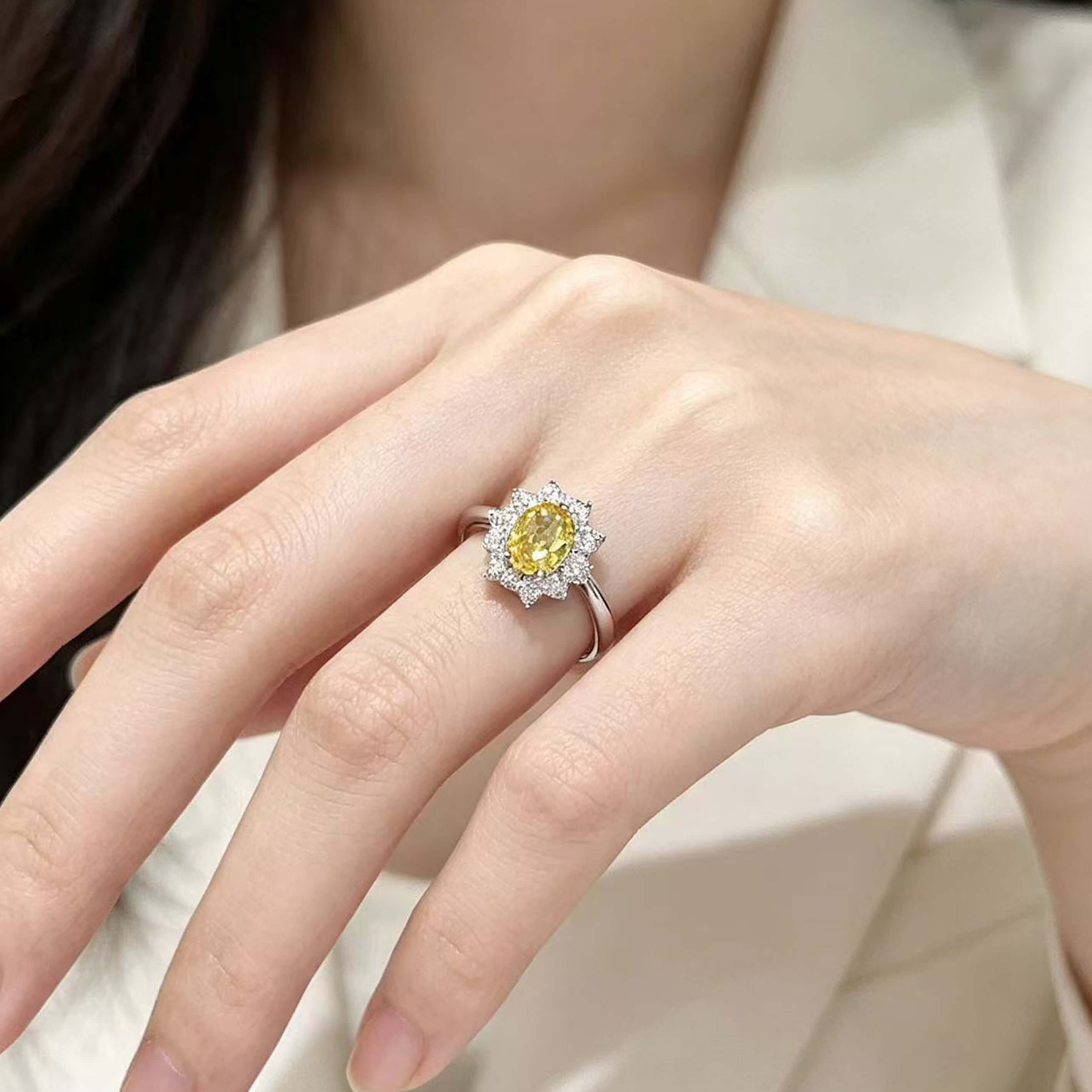 Halo setting oval cut lab grown yellow diamond engagement ring