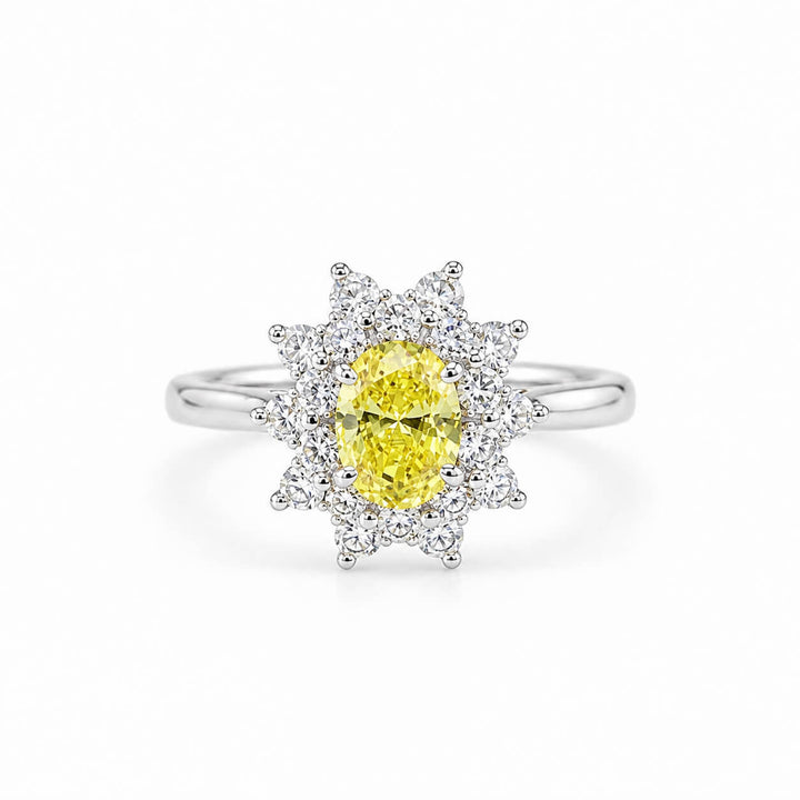 Halo setting oval cut lab grown yellow diamond engagement ring