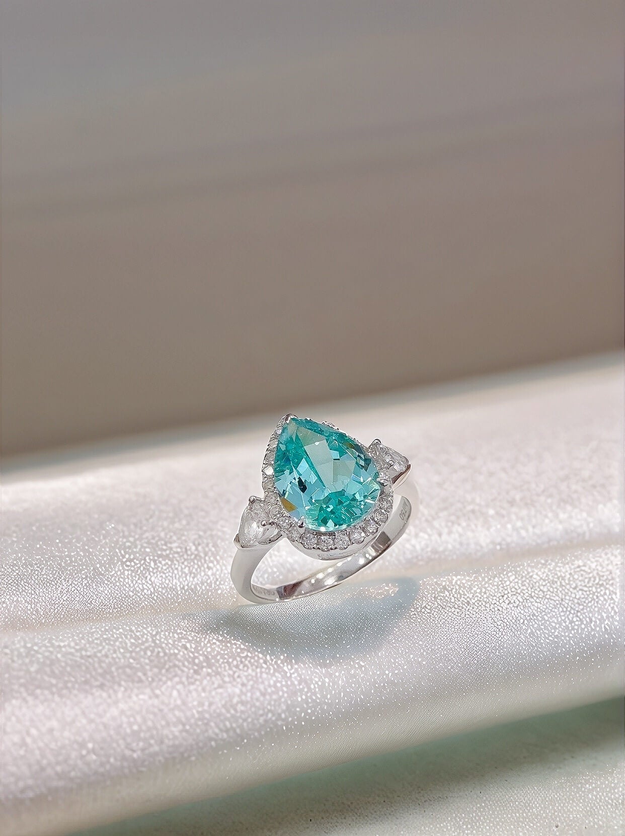Halo setting pear cut  lab grown Paraiba engagement ring