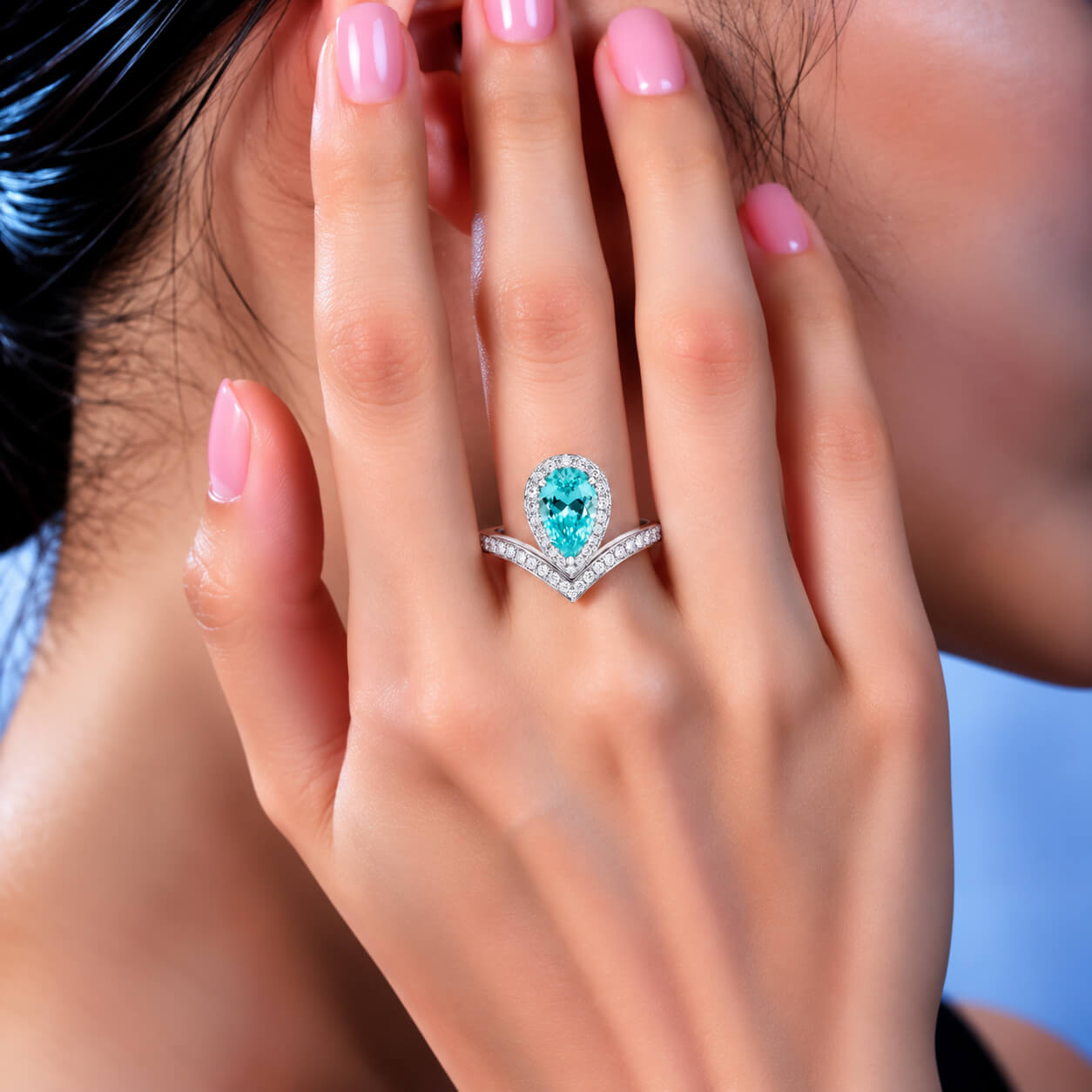 Halo setting pear cut  lab grown Paraiba engagement ring