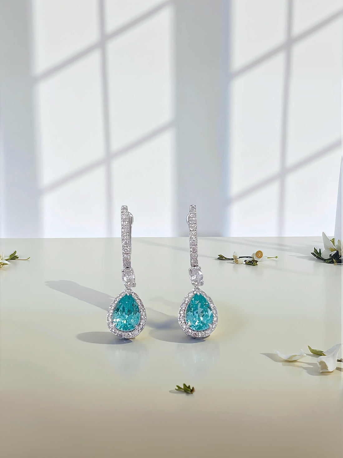 Halo setting pear cut lab grown Paraiba hoop earrings