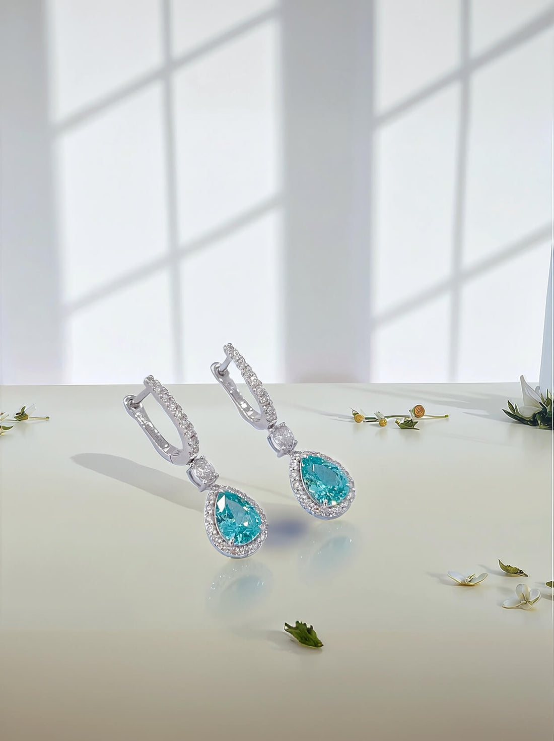 Halo setting pear cut lab grown Paraiba hoop earrings