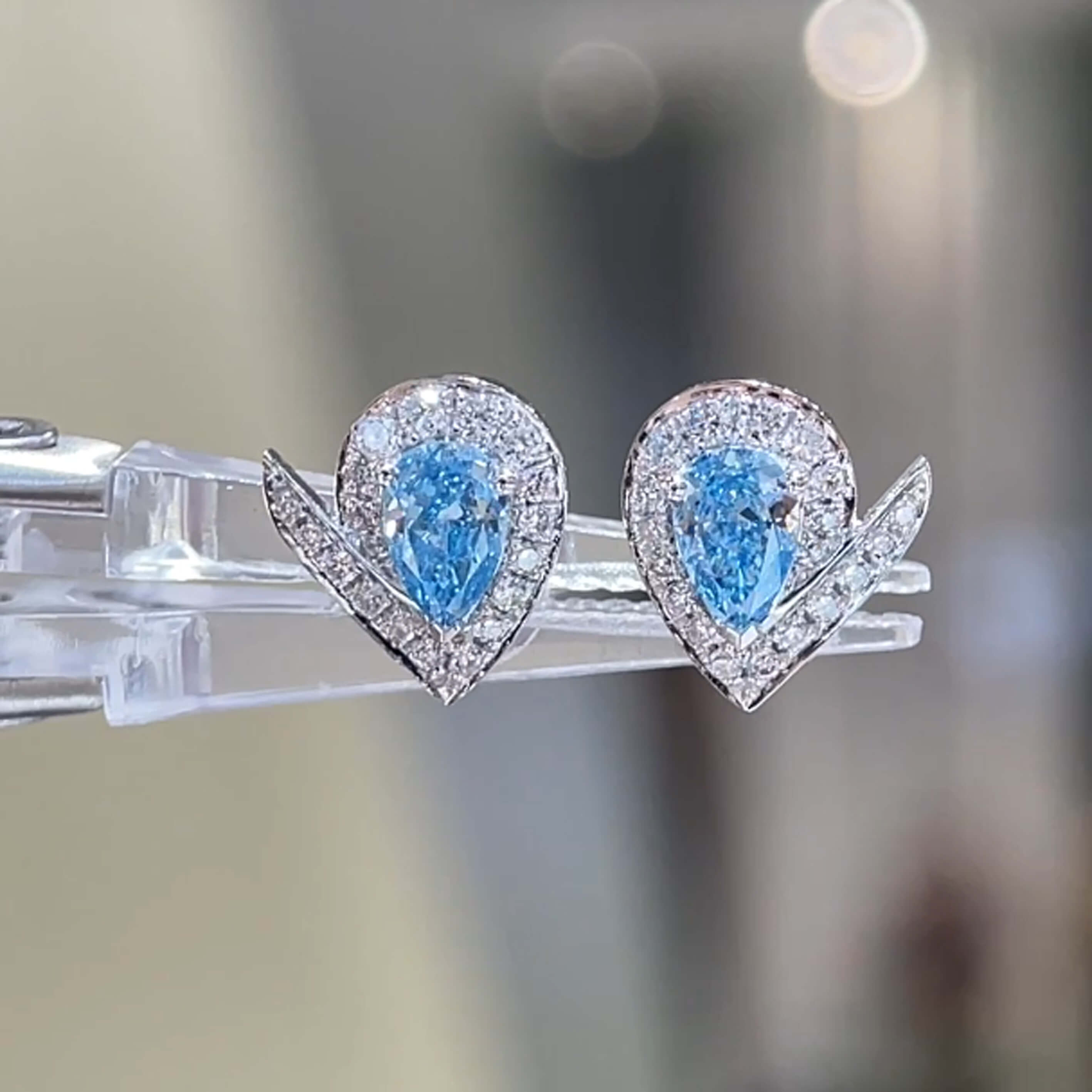 Halo setting pear cut lab grown blue diamond earrings stud