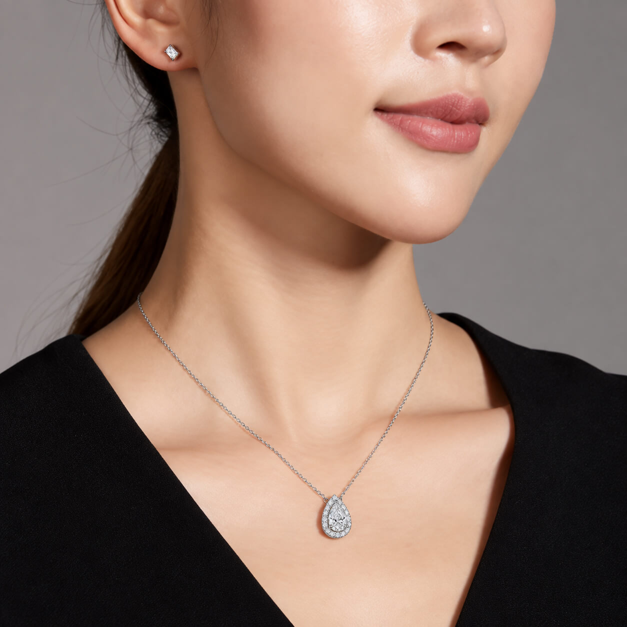 Halo setting pear cut lab grown diamond pendant necklace