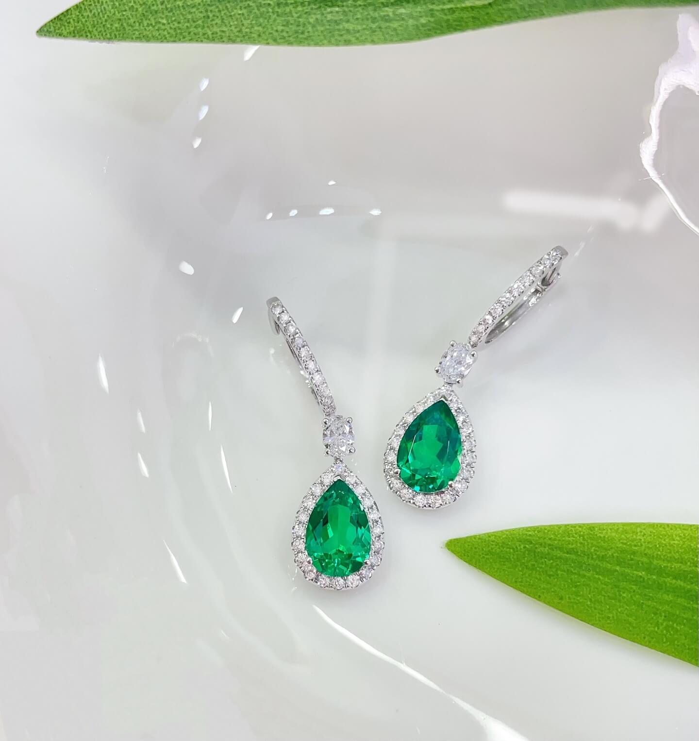 Halo setting pear cut lab grown emerald hoop earrings