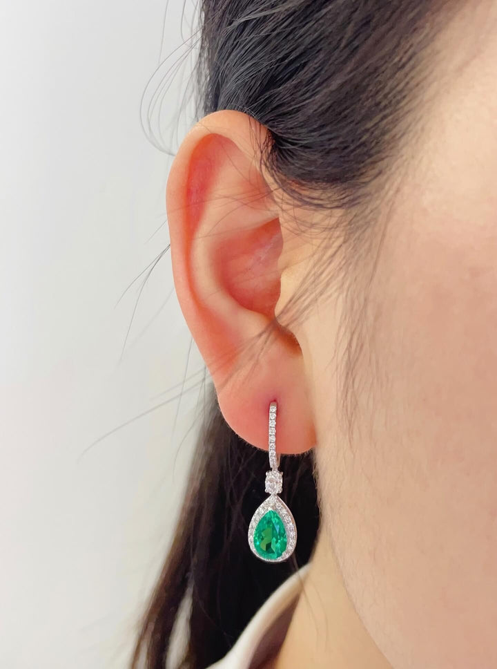 Halo setting pear cut lab grown emerald hoop earrings