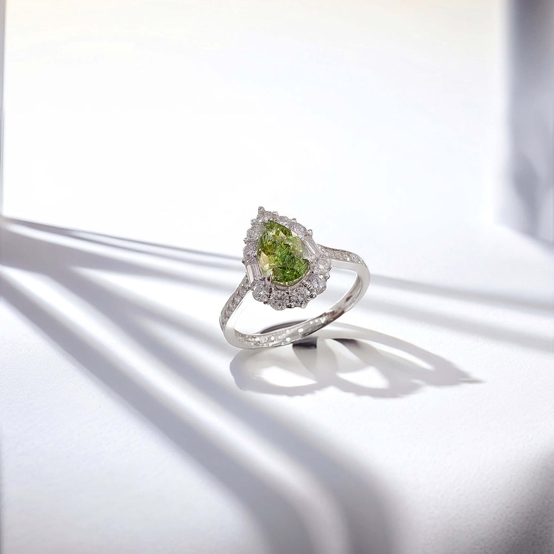Halo setting pear cut lab grown green diamond engagement ring