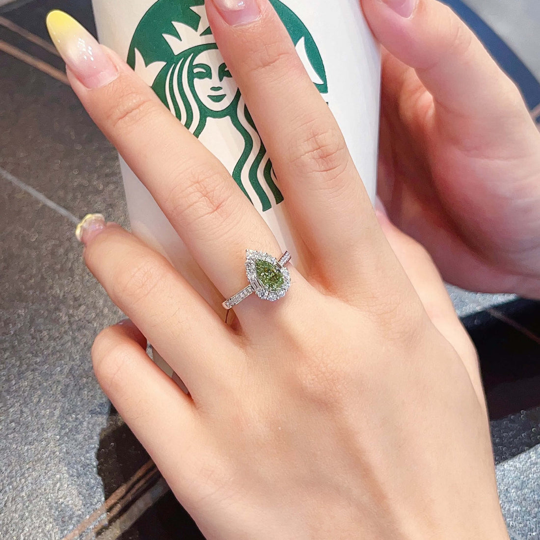 Halo setting pear cut lab grown green diamond engagement ring