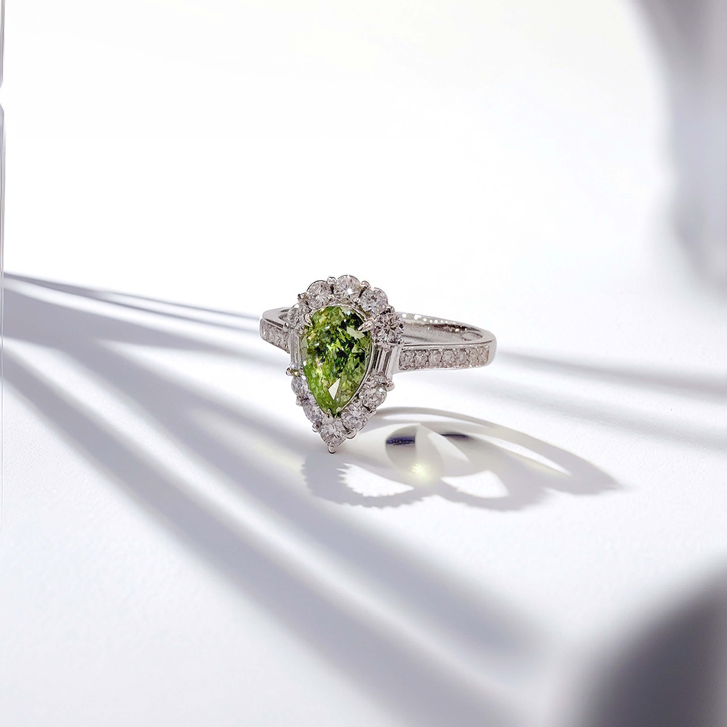 Halo setting pear cut lab grown green diamond engagement ring